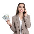 Happy young businesswoman with money talking on phone Royalty Free Stock Photo