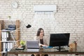 Businesswoman Working In Office With Air Conditioning