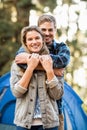 Happy young camper couple looking at the camera Royalty Free Stock Photo