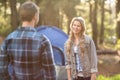 Happy young camper couple looking at each other Royalty Free Stock Photo