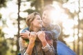 Happy young camper couple looking at each other Royalty Free Stock Photo