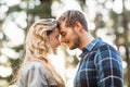 Happy young camper couple touching foreheads Royalty Free Stock Photo
