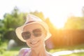 Happy young caucasian bald hipster woman in hat and casual clothes enjoying life after surviving breast cancer. Portrait