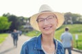 Happy young caucasian bald woman in hat and casual clothes enjoying life after surviving breast cancer. Portrait of beautiful Royalty Free Stock Photo