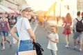 Happy young caucasian bald woman in hat and casual clothes enjoying life after surviving breast cancer. Portrait of beautiful