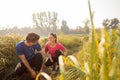 Young couple preparing for morning run, tying shoelaces