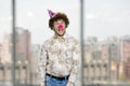 Happy young caucasian guy with clown nose fooling around making funny faces. Royalty Free Stock Photo