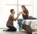 Happy couple arrived to hotel room on honeymoon Royalty Free Stock Photo