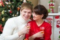 Happy young couple celebrating Christmas or new year Royalty Free Stock Photo