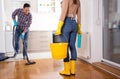 Young couple doing chores together Royalty Free Stock Photo