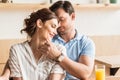 happy young couple dating in cafe