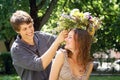 Happy young couple with diadem