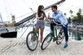 Happy young couple eating ice cream in the street. Royalty Free Stock Photo