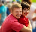 Happy young couple embracing and smiling Royalty Free Stock Photo