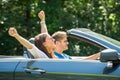 Couple Enjoying Drive In A Car