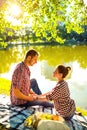 Happy young couple enjoying picnic. Toned image Royalty Free Stock Photo