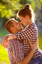 Happy young couple enjoying picnic. Toned image Royalty Free Stock Photo