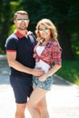 Happy young couple enjoying summer green park Royalty Free Stock Photo