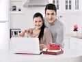 Happy young couple with gift boxes Royalty Free Stock Photo