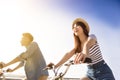 Happy young couple going for bicycle ride