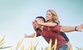 Happy young couple have fun at the field in summer, happy future Royalty Free Stock Photo