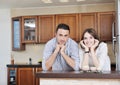 Happy young couple have fun in modern kitchen Royalty Free Stock Photo