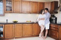 Happy young couple have fun in modern kitchen Royalty Free Stock Photo