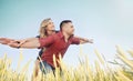 happy young couple have fun at wheat field in summer, happy future concept Royalty Free Stock Photo
