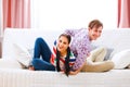 Happy young couple having fun at home Royalty Free Stock Photo