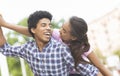 Happy young couple having fun and laughing together outdoors Royalty Free Stock Photo