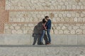 Happy young couple having fun outdoors on a sunny day. Urban, architecture. Fun and lifestyle Royalty Free Stock Photo