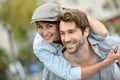 Happy young couple having fun in the streets Royalty Free Stock Photo