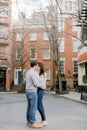 A happy young couple having a romantic moment in an urban setting in West Village in NYC Royalty Free Stock Photo