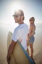 Happy young couple holding hands at beach Royalty Free Stock Photo