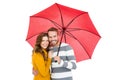 Happy young couple holding pink umbrella Royalty Free Stock Photo