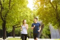 Happy young Couple jogging and running  in park Royalty Free Stock Photo