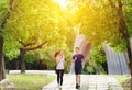 Happy young Couple jogging and running  in park Royalty Free Stock Photo