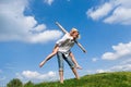 Happy Young Couple - jumping in the sky Royalty Free Stock Photo