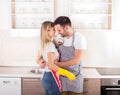 Young couple hugging after housework Royalty Free Stock Photo