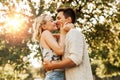 happy young couple kissing and hugging outdoors Royalty Free Stock Photo