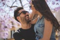 Happy young couple looking at each other laughing Royalty Free Stock Photo