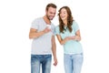 Happy young couple looking at mobile phone Royalty Free Stock Photo