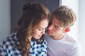 Happy young couple in love close to each other tenderly kissing Royalty Free Stock Photo