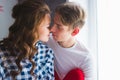 Happy young couple in love close to each other tenderly kissing Royalty Free Stock Photo