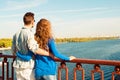 Happy young couple in love embracing each other on the bridge Royalty Free Stock Photo