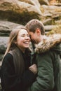 Happy young couple in love friends dressed in casual style walking together on nature park forest in cold season, family Royalty Free Stock Photo