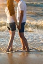 Happy young couple in love have fun on beautiful beach at beautiful summer day. Close Up Royalty Free Stock Photo