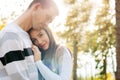 Happy young couple in love hugging. Park outdoors date. Loving couple Royalty Free Stock Photo