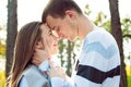 Happy young couple in love hugging. Park outdoors date. Loving couple Royalty Free Stock Photo