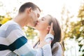 Happy young couple in love kissing. Outdoors date. Loving couple relationship. Royalty Free Stock Photo